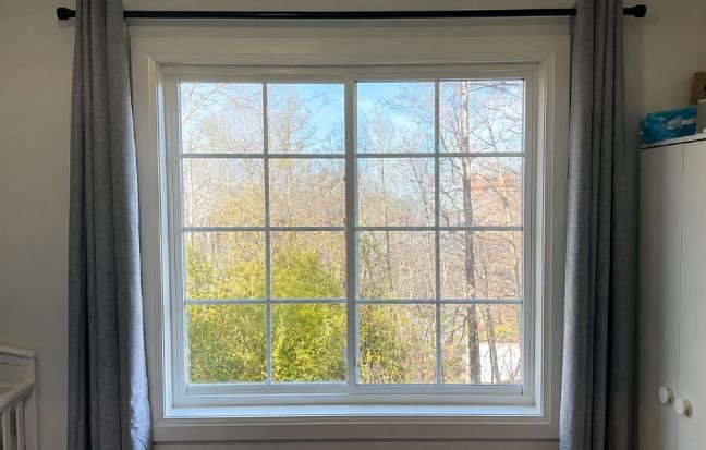 Bedroom window before Shadesloft California shutters installation