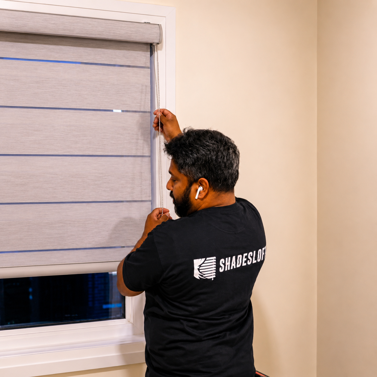 Shadesloft technician installing custom zebra blinds in a GTA home